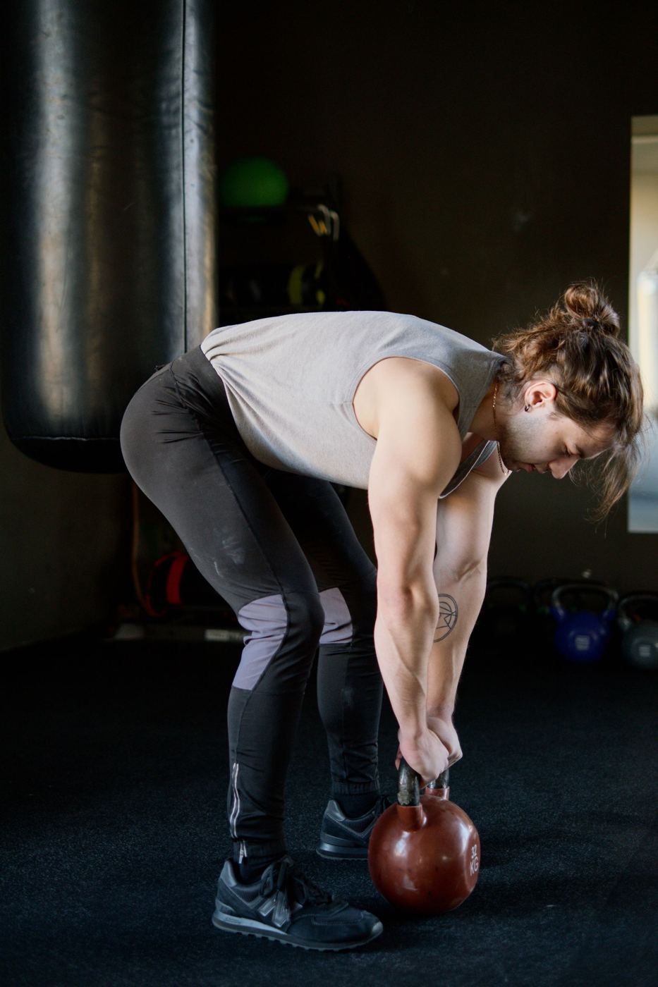 Man doing a kettlebell deadlift