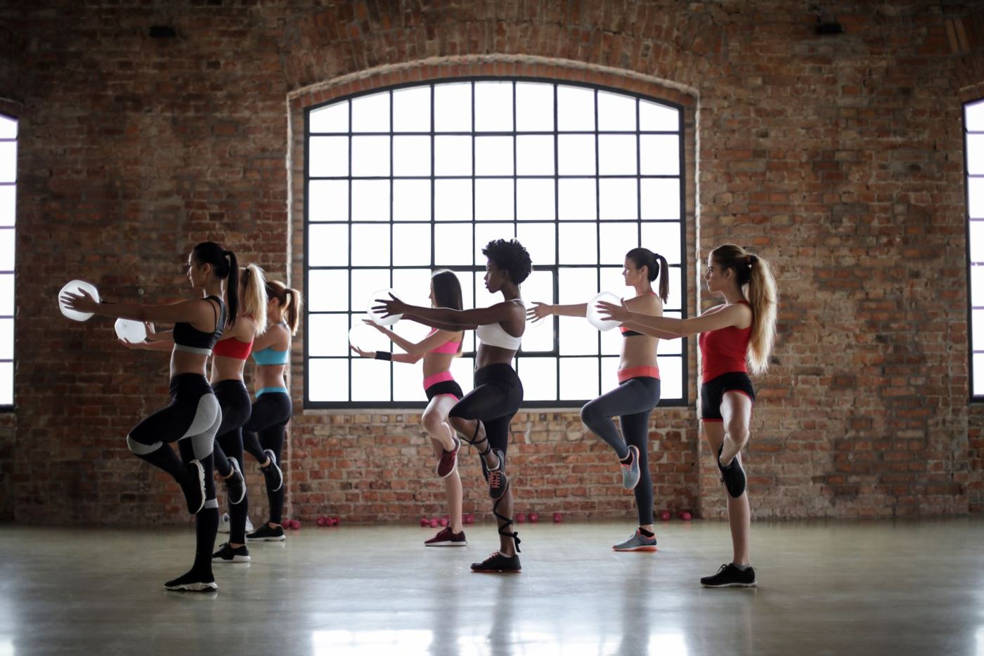 Group stretching on yoga mats